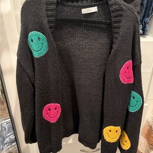 TALULAH Black and Green Cardigan with Playful Smiley Design